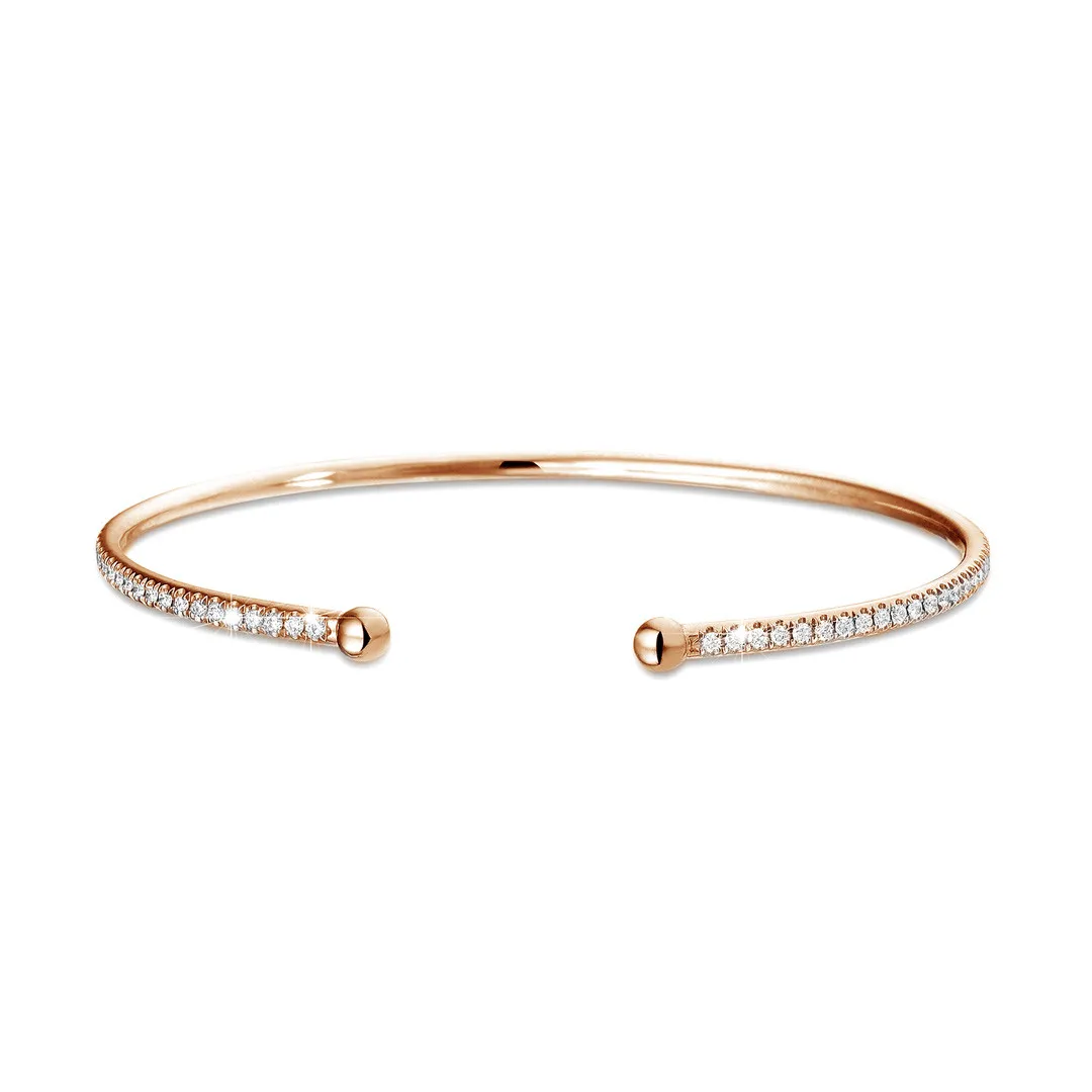 0.75 quilates pulsera diamante abierta en oro rojo 