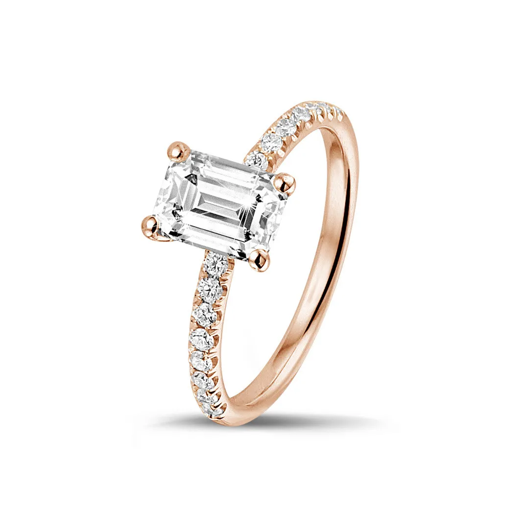 1.00 quilates anillo solitario con diamante talla esmeralda en oro rojo con diamantes en los lados 