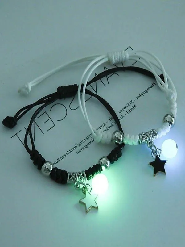 2 pulseras de cuerda luminosa con abalorio de estrella.