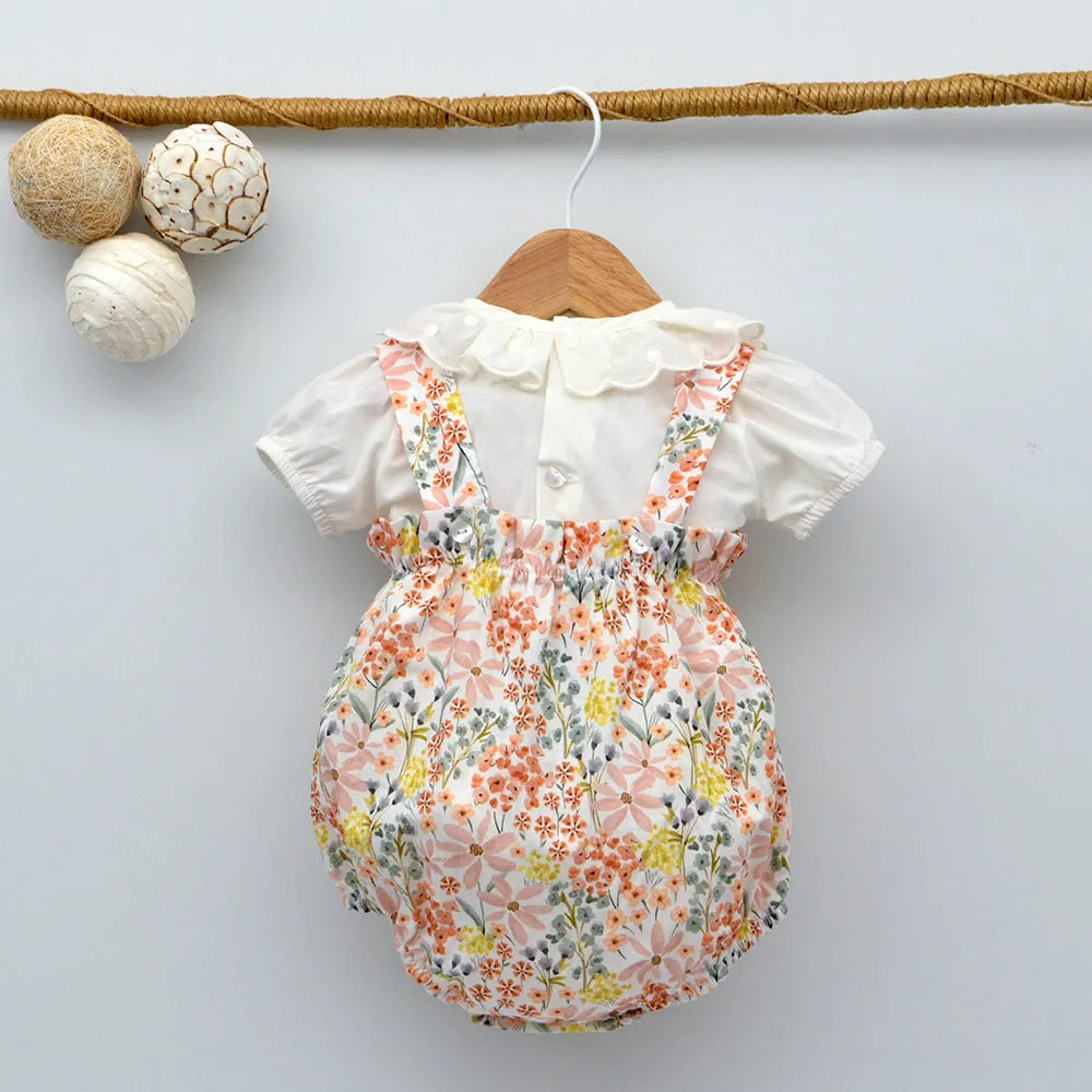 Body bebé Abril camisa con bodoques manga corta