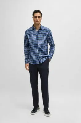 Pantalones cargo relaxed fit de tejido elástico jaspeado