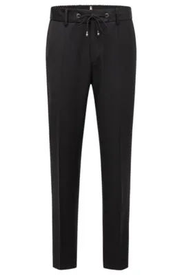 Pantalones slim fit en sarga de lana virgen