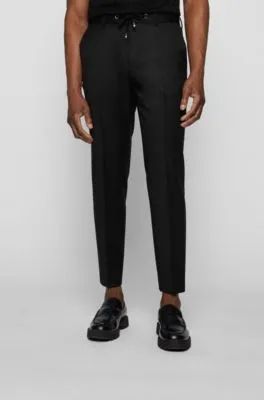 Pantalones slim fit en sarga de lana virgen