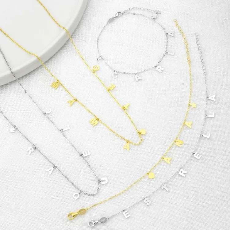 Pulseras de letras y simbolos colgados plata de ley bañado en oro