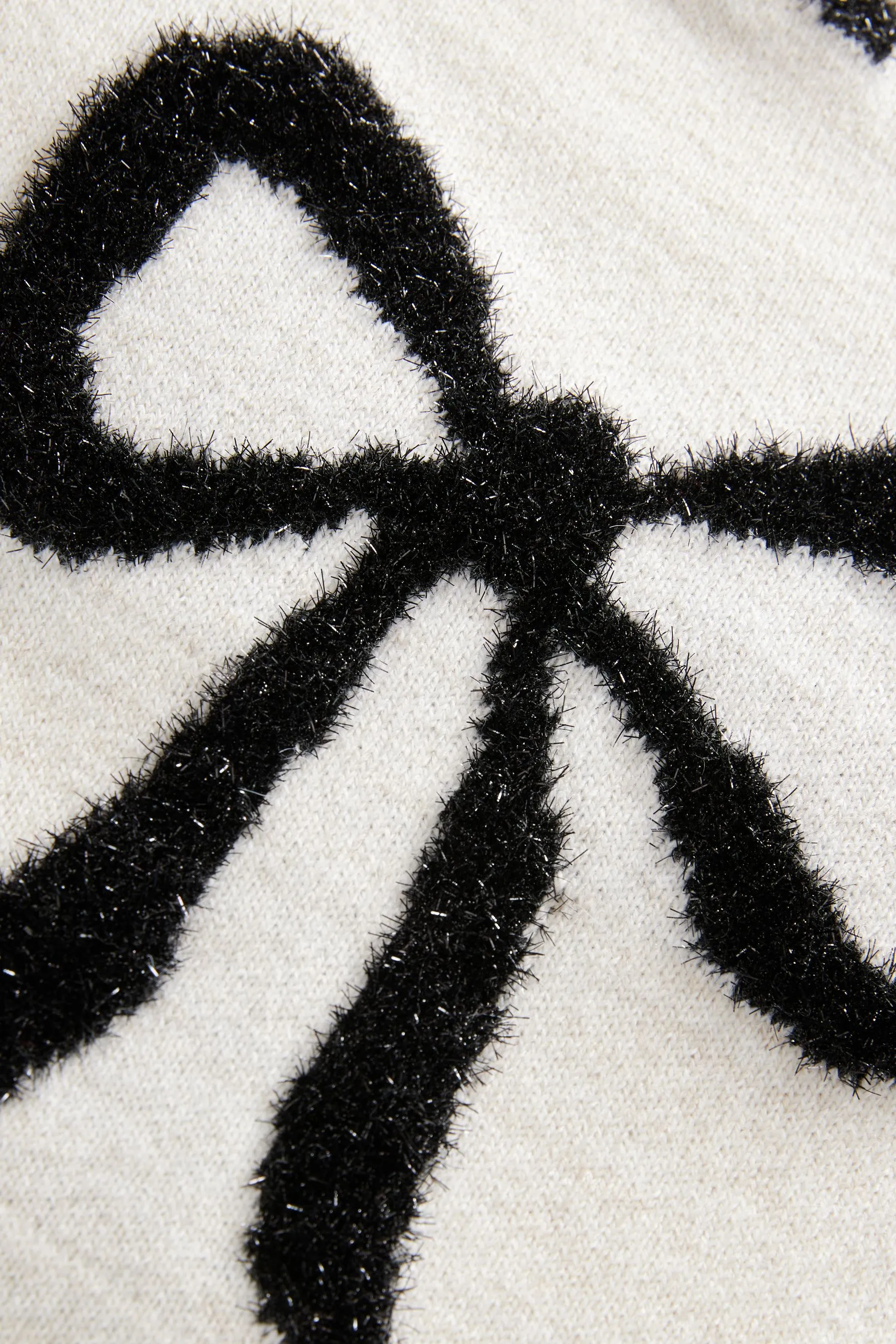WHITE AND BLACK TINSEL BOW  SUéTER DE NAVIDAD DE PUNTO